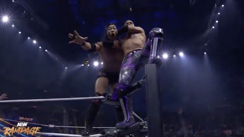 Takeshita and Romero in the ring