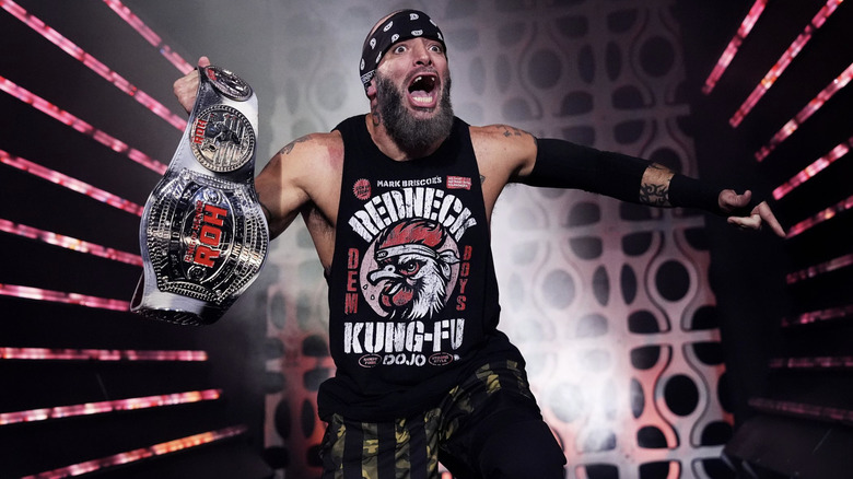 Briscoe with the Ring of Honor World Championship on the entrance ramp