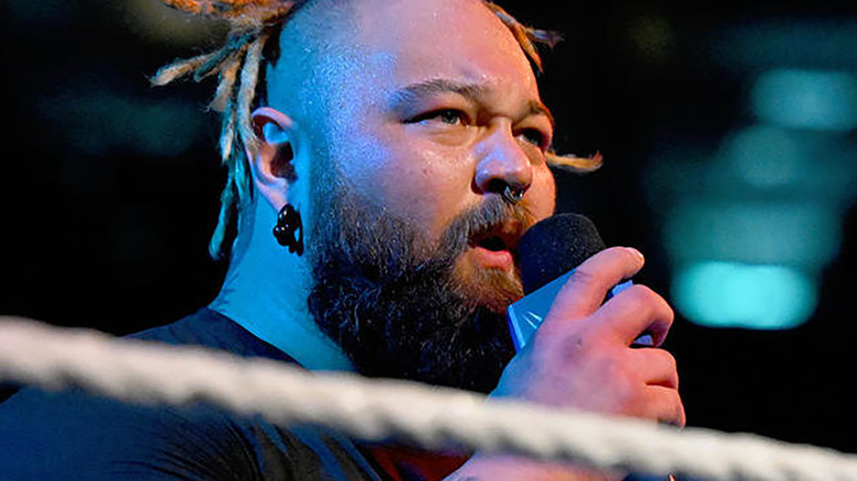 Bray Wyatt speaking into microphone