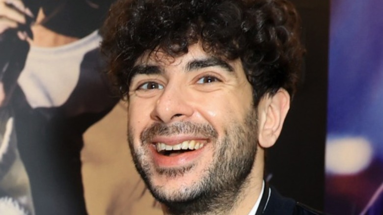 Tony Khan with a big smile on his face