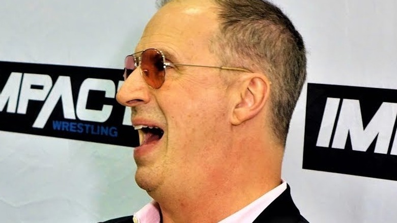 Don Callis talking at a press conference 