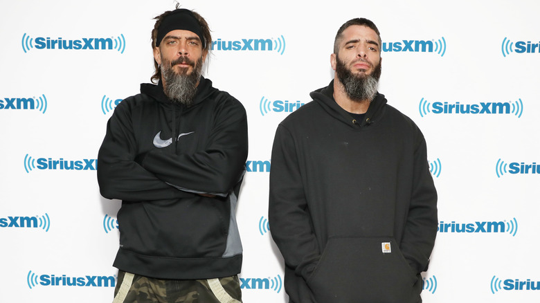 Jay and Mark Briscoe posing for a photo at an event