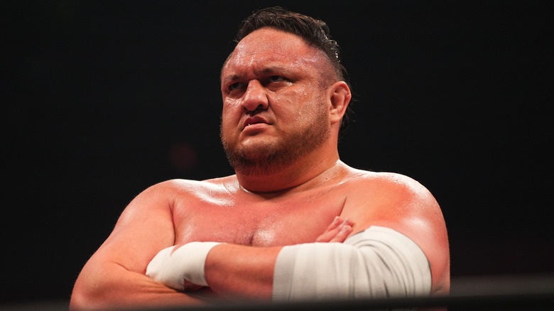 Samoa Joe with his arms folded