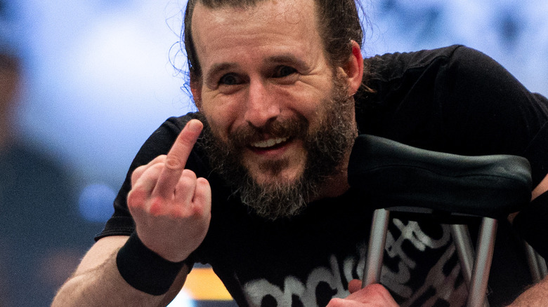 Adam Cole giving the middle finger