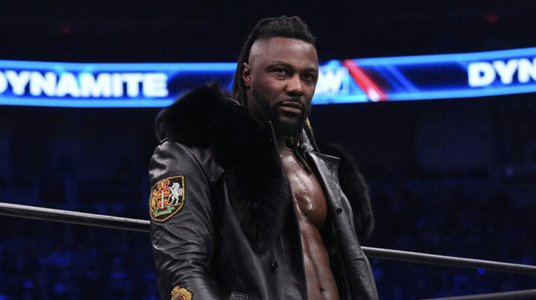 Swerve Strickland wearing leather jacket glaring in wrestling ring on AEW Dynamite