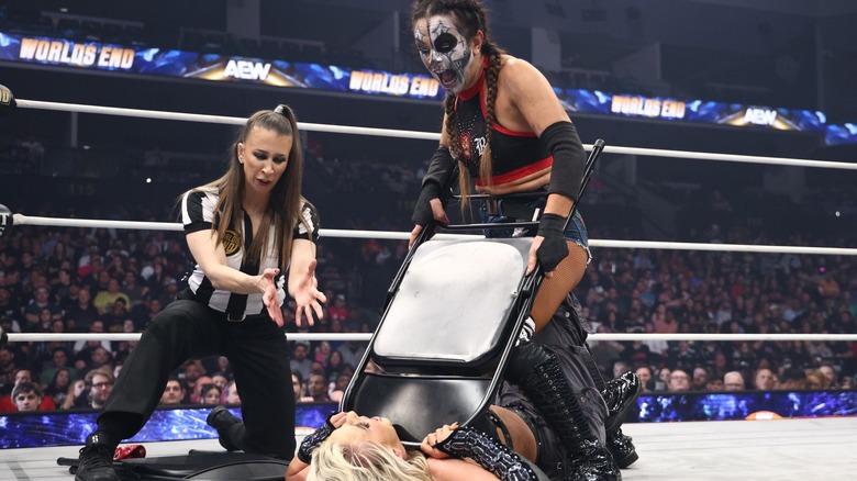 Thunder Rosa chokes Mariah May with a steel chair