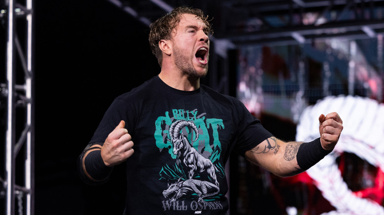 Will Ospreay poses on the stage and looks to the fans before heading down the ramp for a match in AEW.