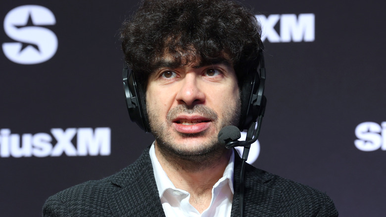 Tony Khan wearing a helmet