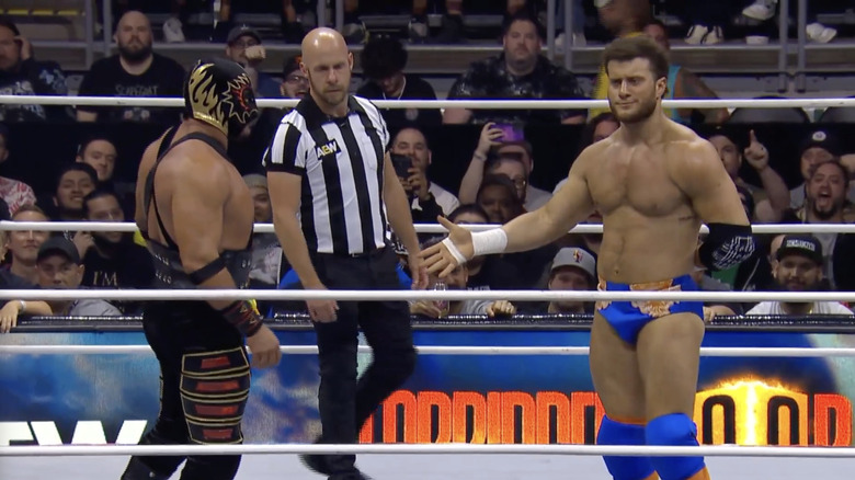 MJF offering his hand to Hechicero