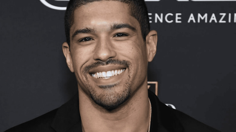 Anthony Bowens smiles at a red-carpet event.