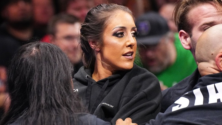 Dr. Britt Baker D.M.D. in a hoodie