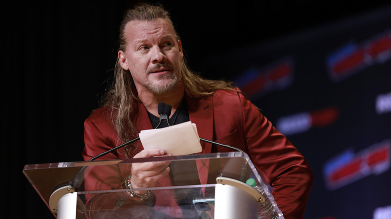 Chris Jericho reading from cue cards