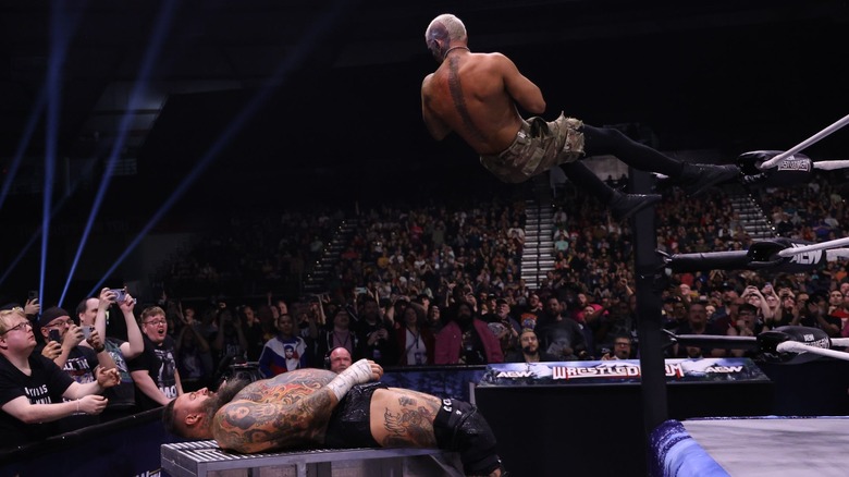 Darby Allin performing the Coffin Drop on Brody King