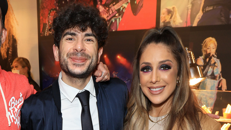 Tony Khan and Britt Baker taking a nice photo together