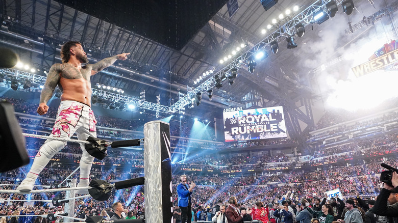 Jey Uso pointing at the WrestleMania sign after winning 2025's Royal Rumble