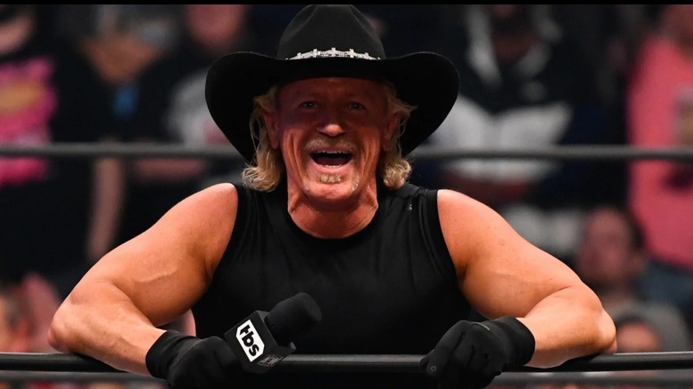 Jeff Jarrett laughs on after a remark made in the ring