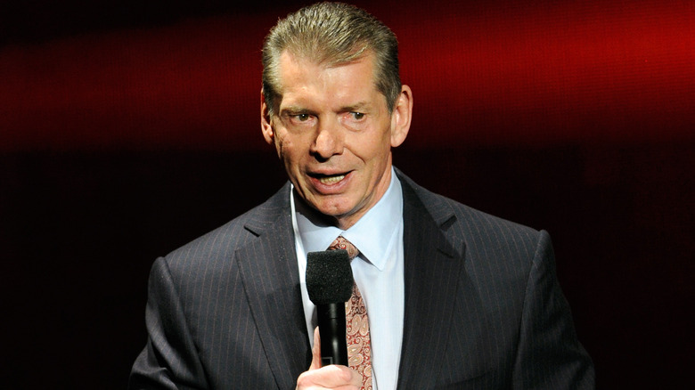 Former WWE Chairman and CEO Vince McMahon speaks at a news conference announcing the WWE Network