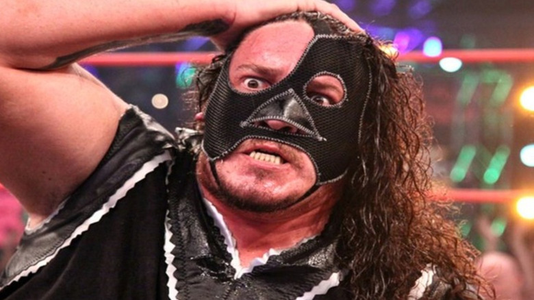 Abyss wearing a black mask