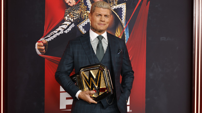 Cody Rhodes posing with the Undisputed WWE Championship