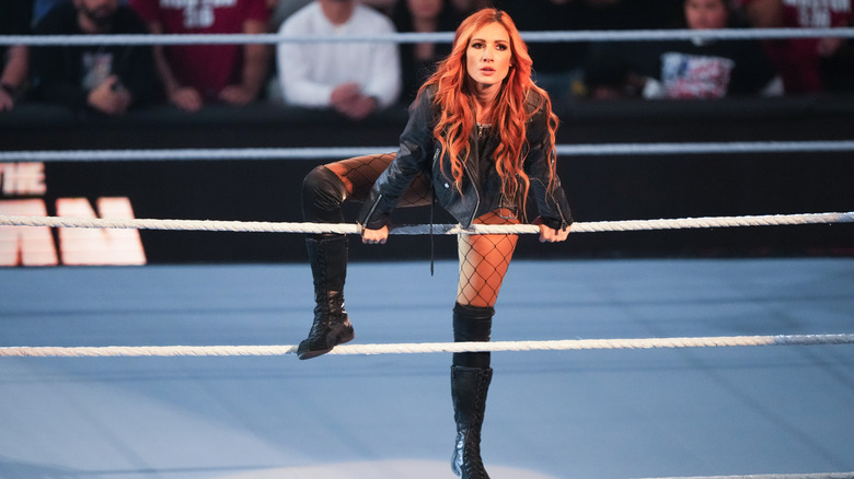 Becky Lynch standing on the ring ropes