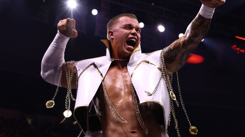 Kyle Fletcher wearing a white ring jacket