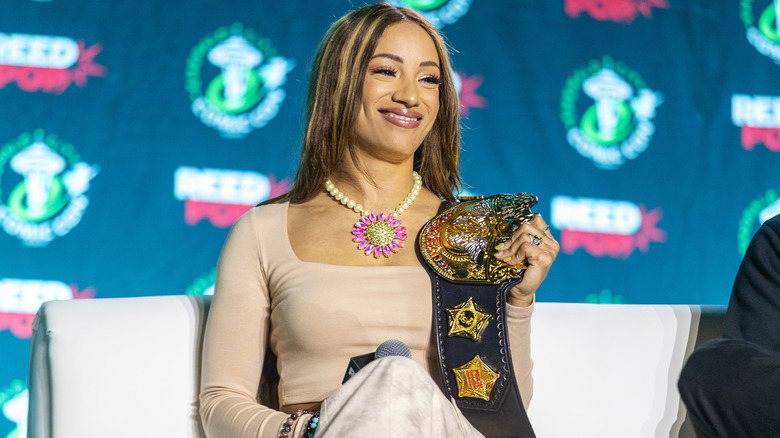 Mercedes Mone with the IWGP Women's Championship