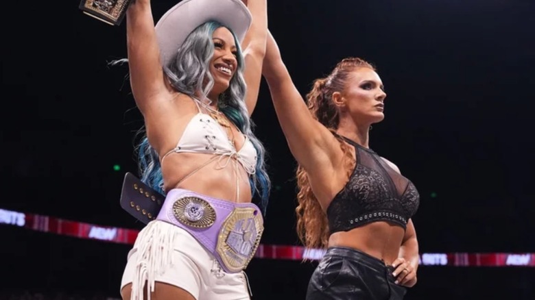 Kamille stands besides TBS Champion Mercedes Mone on an episode of AEW TV.