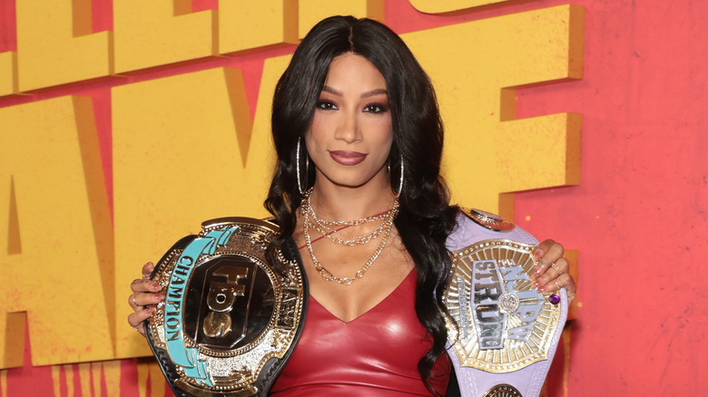 Mercedes Mone with title belts