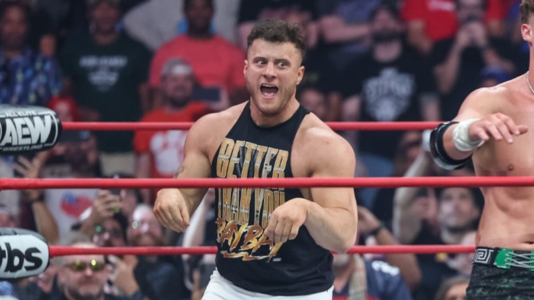 MJF, poised to hit a kangaroo kick or do the "Thriller" dance