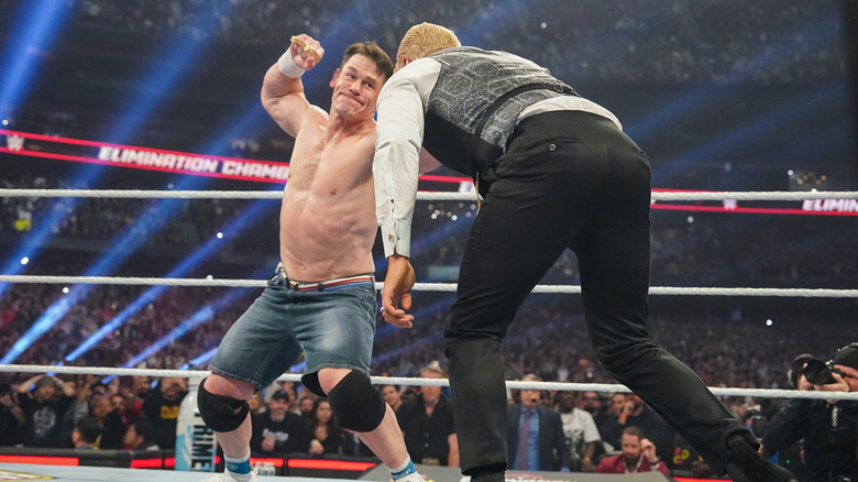 John Cena attacking Cody Rhodes