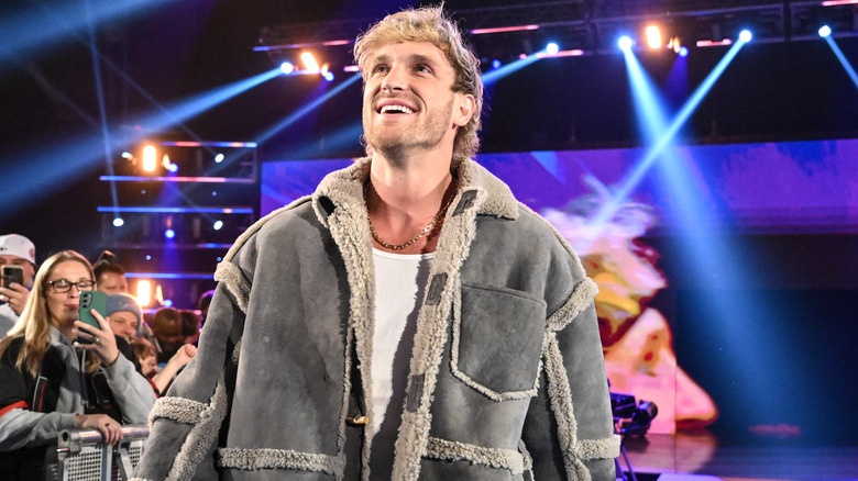 Logan Paul wearing a grey jacket