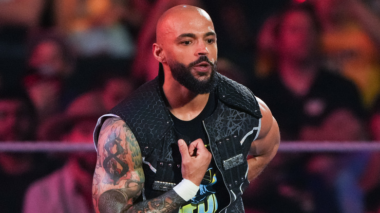 Ricochet wearing a sleeveless jacket