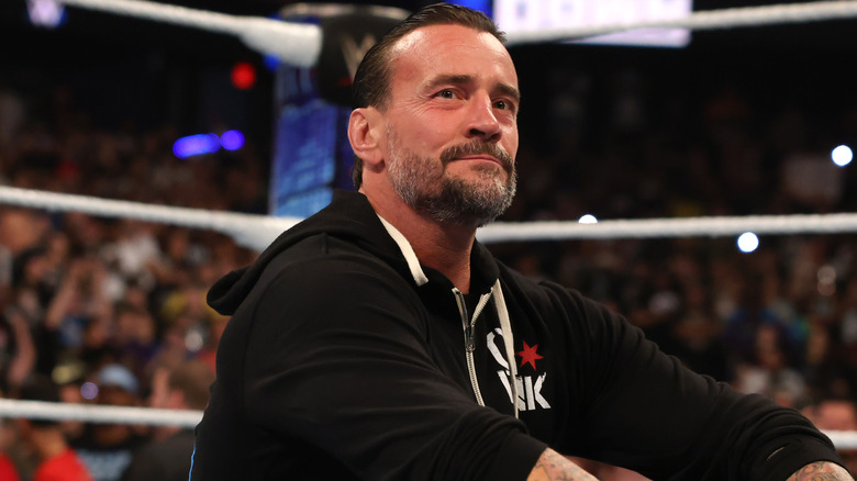 CM Punk smiling slightly