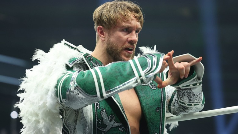 Will Ospreay wearing a green jacket