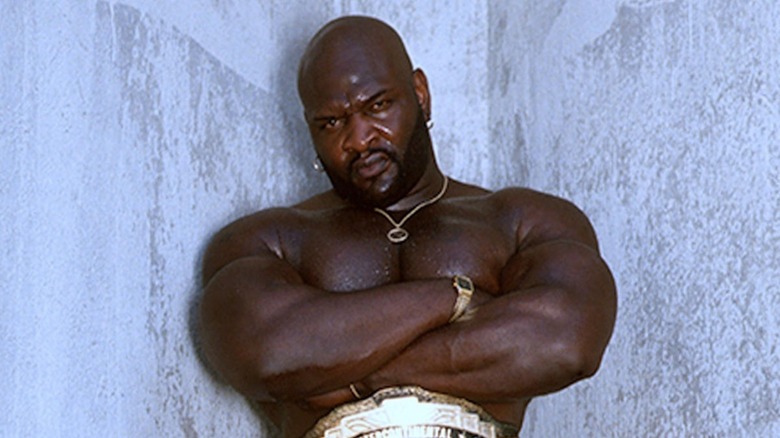 Ahmed Johnson with his arms folded