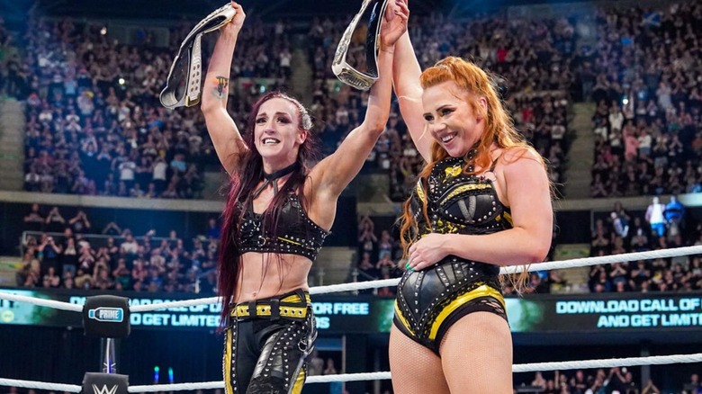 Alba Fyre and Isla Dawn hold up the WWE Women's Tag Team Championships