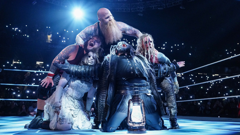 The Wyatt Sicks posing in the ring on WWE television