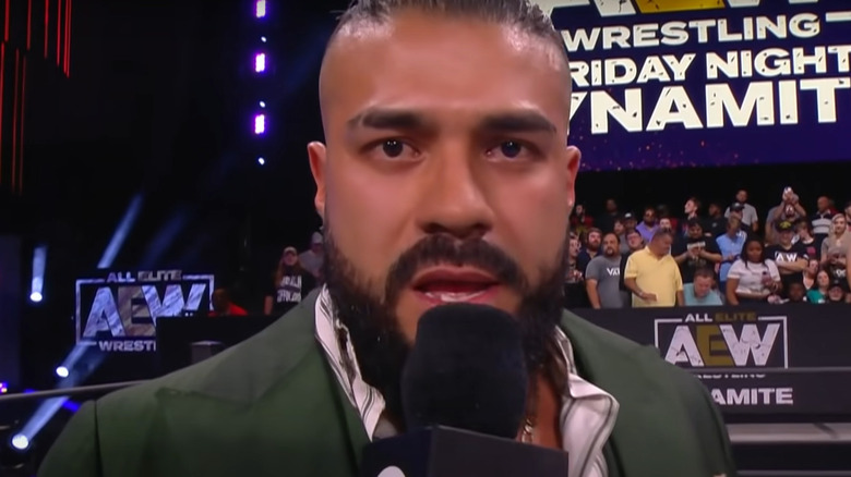 Andrade El Idolo talking into a microphone