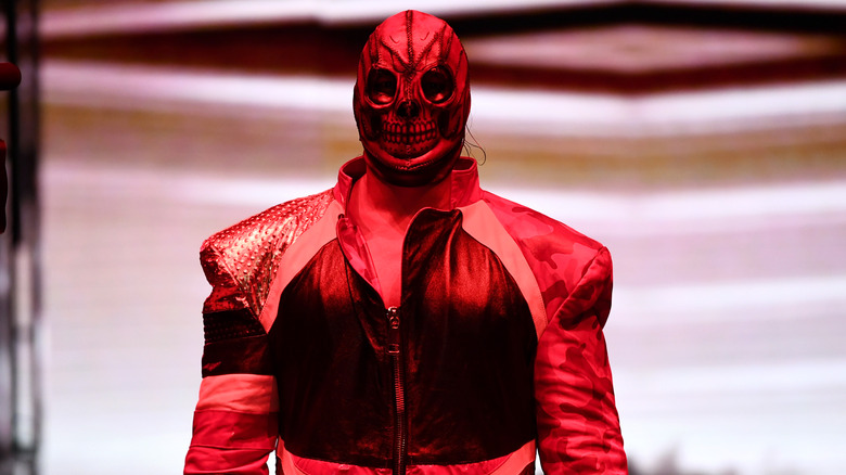 Andrade in a mask