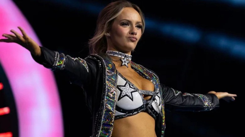 Anna Jay poses on the stage before heading down the ring for a match on an episode of AEW TV.