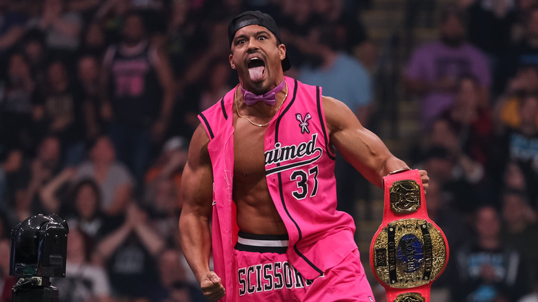 Anthony Bowens holding the AEW World Trios Championship