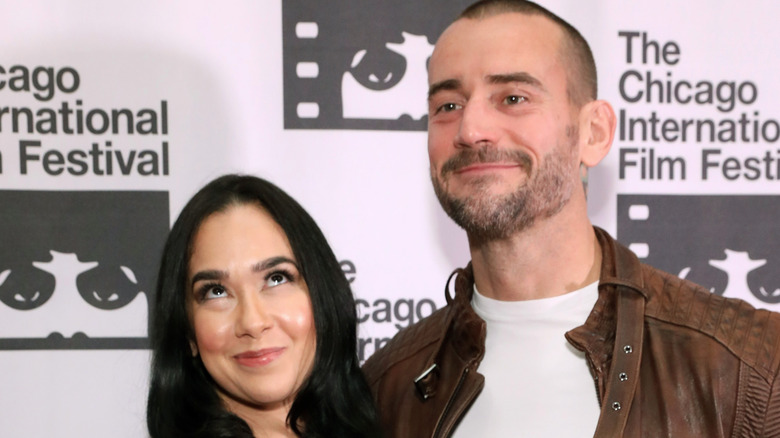 CM Punk poses with AJ Mendez