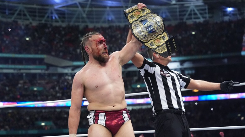 Bryan Danielson celebrating his win at AEW All In