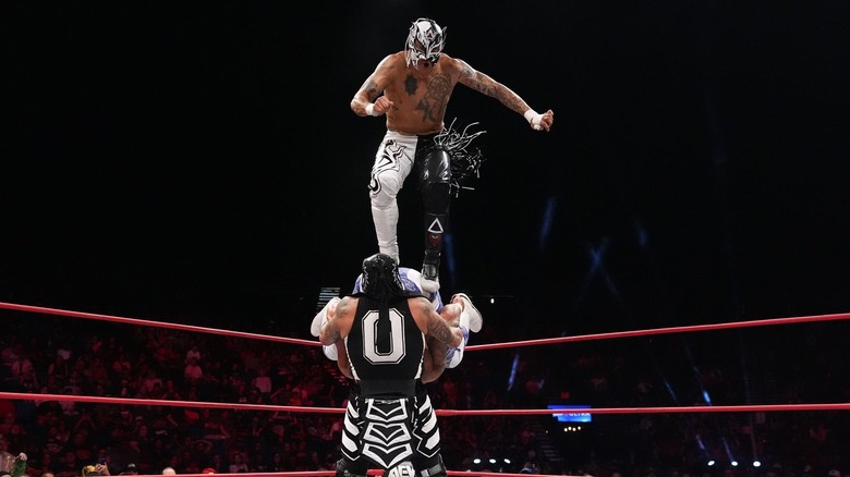 Ray Fenix and Penta performing a double team move