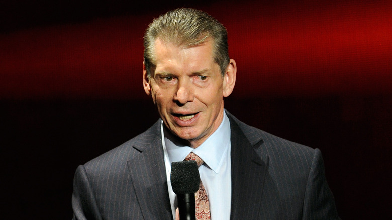 Vince McMahon on the mic 