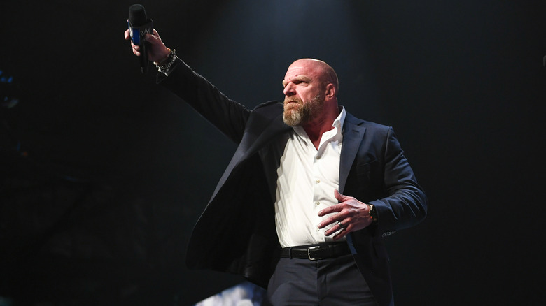 Triple H posing