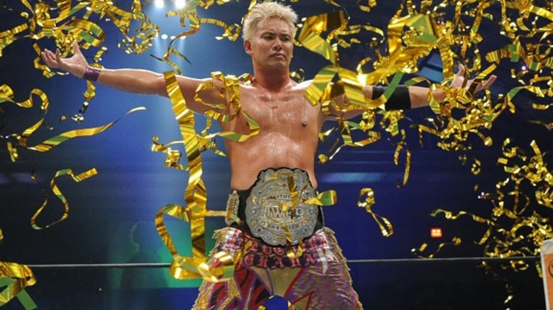 Kazuchika Okada poses in NJPW