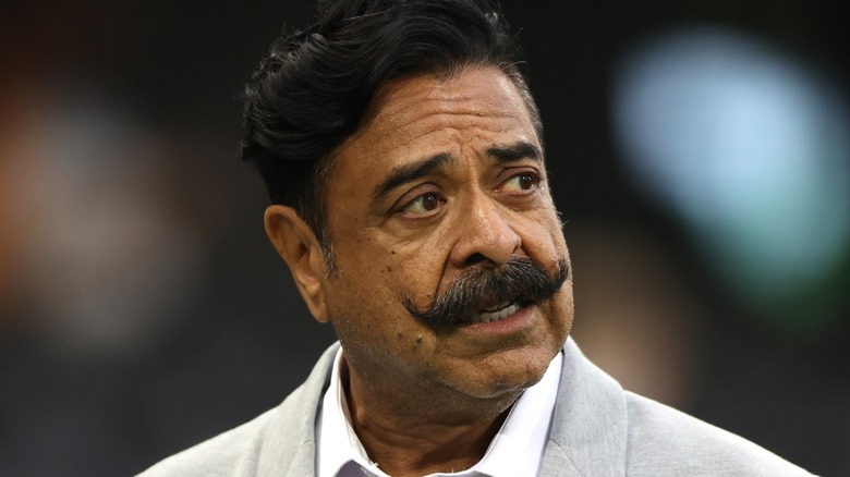 Shahid Khan observing