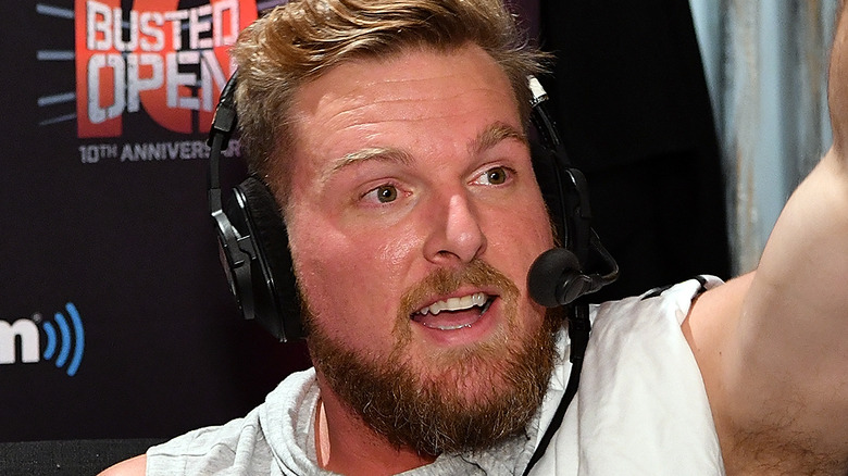 Pat McAfee wearing a headset