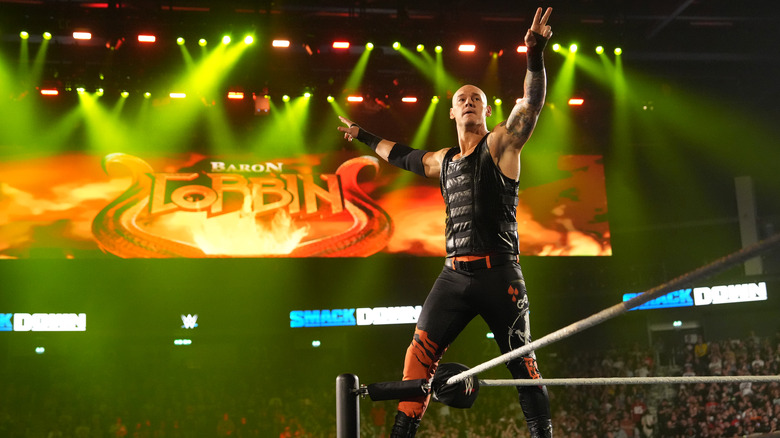 Baron Corbin posing on the ring ropes